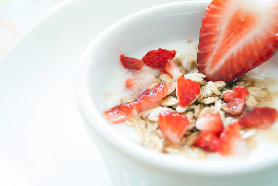 Strawberries and granola in coconut milk Strawberries and granola in coconut milk